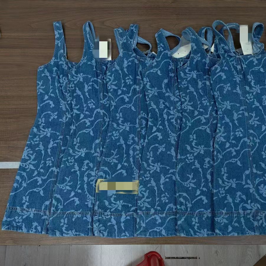 Denim finishing and hardware detail inspection for custom jeans production