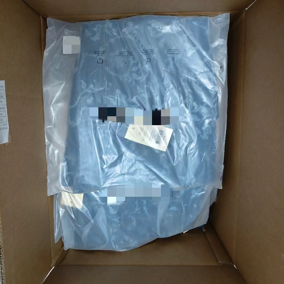 Final denim quality inspection and packaging review before shipment