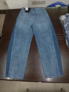 Women’s wide-leg denim jeans showing light-blue wash, waistband and leg silhouette